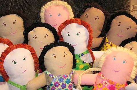 rag doll: a doll made from cloth and stuffed with rags
