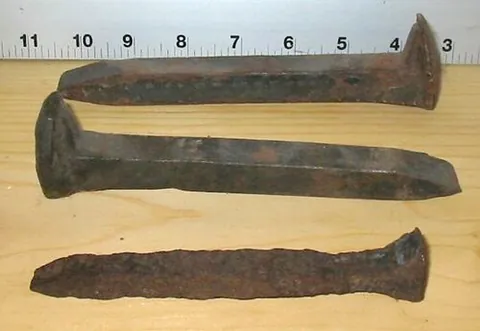rail spike: a type of large nail with an offset head used to fasten a rail or base plate to a wooden railroad...