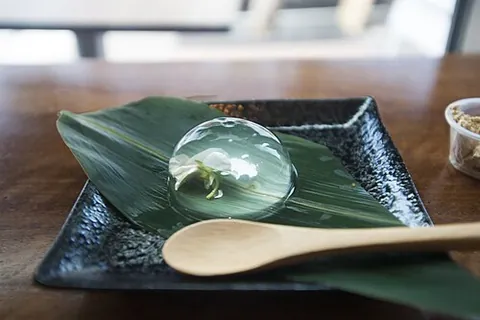 raindrop cake: a dessert made with water and agar which resembles a drop of water, sometimes with fruit suspended...