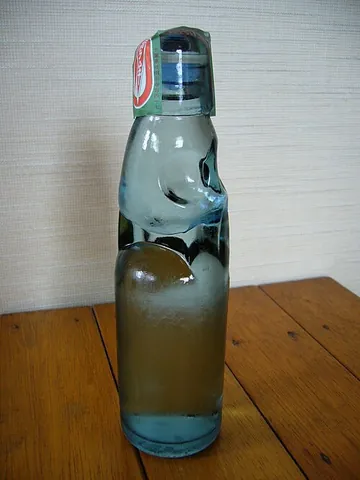 ramune: a type of Japanese carbonated soft drink generally bottled in a Codd-neck bottle