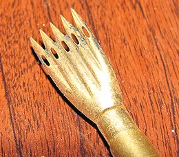rastrum: a five-pointed writing implement used to draw parallel lines of a staff in sheet music