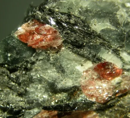 rastsvetaevite: a trigonal-ditrigonal pyramidal pink mineral containing calcium, chlorine, hydrogen, iron, oxygen,...