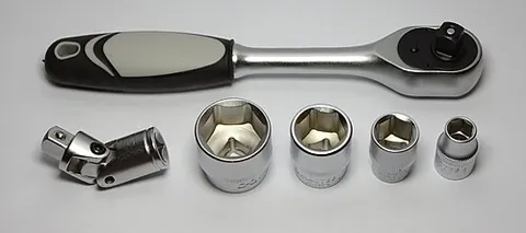 ratchet wrench: a wrench, implementing a ratchet mechanism, usually used with a set of sockets to engage the head...
