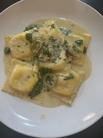 ravioli: small square parcels of pasta filled with meat, cheese, spinach etc