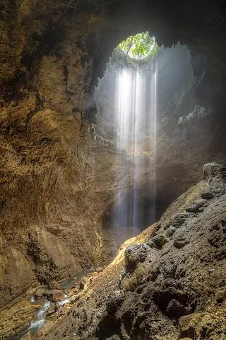 ray of light: a path that a photon or a group of photons takes through space, visible as a column of light