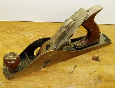 rebate plane: a hand plane designed for cutting rebates in wood