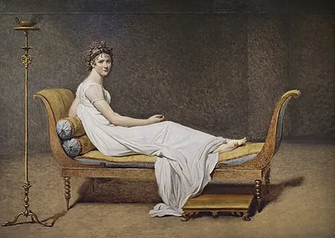 recamier: an old-fashioned couch with headrest and footrest