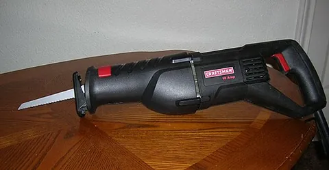 reciprocating saw: a power saw which moves the blade back and forth