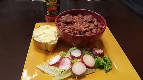 red beans and rice: a Louisiana Creole dish made with small red beans, vegetables, spices, oftentimes pork bones,...