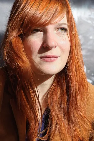 red hair: hair of a ginger or auburn color