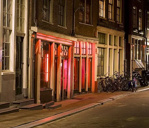 red-light district: a part of an urban area where prostitution and sex-oriented businesses are concentrated
