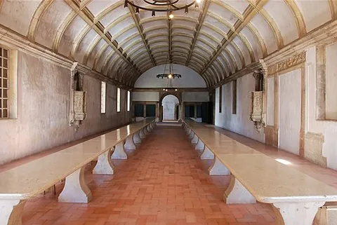 refectory table: a very long dining table mostly used in institutions (e.g., schools, colleges, monasteries)