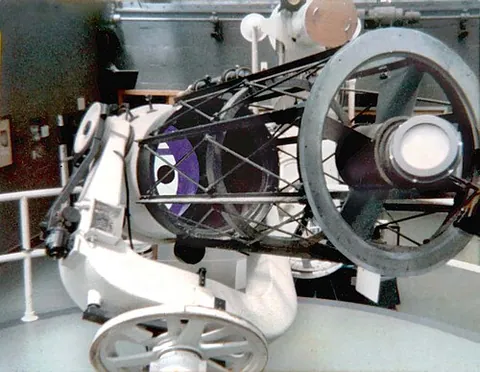 reflecting telescope: a telescope which produces a magnified image by reflecting light through a series of mirrors housed...
