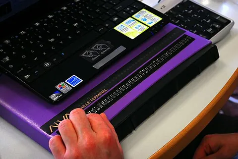 refreshable display: an electromechanical computer peripheral for blind people, translating on-screen text into tactile...