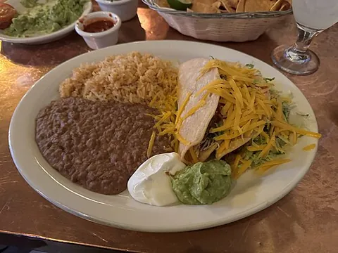 refried beans: a dry to mushy paste made by boiling, mashing, and then frying particularly pinto or black beans,...