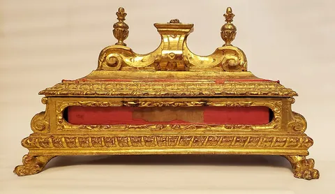 reliquary: a container to hold or display religious relics