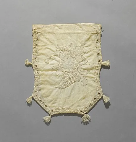 reticule: a reticle; a grid in the eyepiece of an instrument