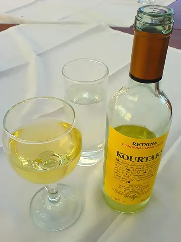 retsina: a Greek resinated white or rosé wine of a sort that has been produced for at least 2700 years