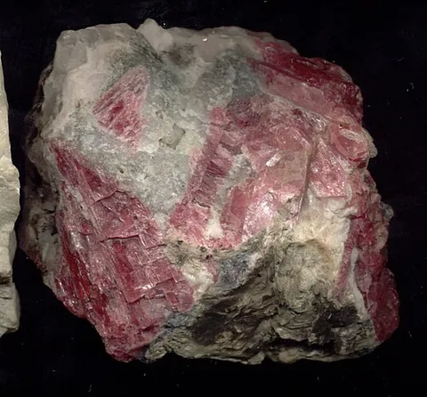 rhodonite: a manganese inosilicate mineral with some substitution by iron and magnesium, of composition...