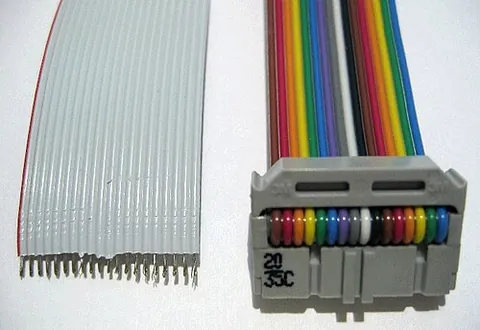ribbon cable: a cable with many conducting wires running parallel to each other on the same flat plane; often...