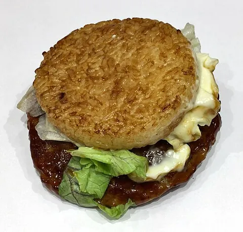 riceburger: an Asian snack food based on the hamburger, with rice patties instead of a bun