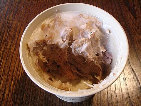 rillette: a dish of meat cooked in fat then shredded and served in a ramekin