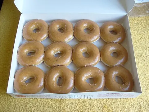 ring doughnut: a doughnut with a hole in the middle, formed in the shape of a ring