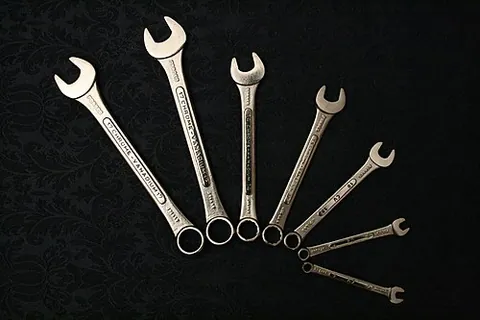 ring spanner: a set of spanners/wrenches with ring and open ends (combination spanners)