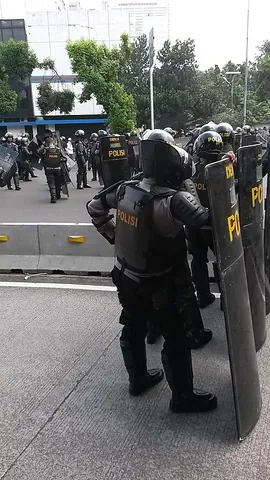 riot police: a unit of the police specifically trained to deal with rioting crowds. They use special equipment...