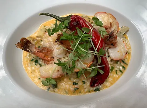 risotto: an Italian savoury dish made with rice and other ingredients