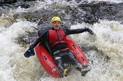 river bugging: a whitewater sport where a single person navigates a stretch of river in a craft known as a river...