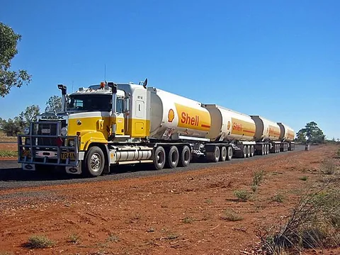 road train: a transport conveyance consisting of a conventional prime mover truck pulling two or more trailers