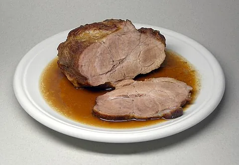 roast pork: pork cooked by roasting
