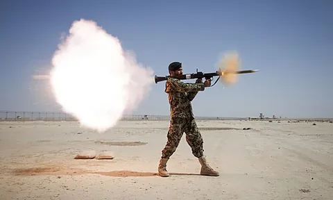 rocket-propelled grenade: a modern hand-held weapons system, comprising a launcher that fires a small explosive rocket