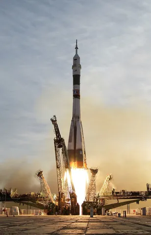 rocket: a cylindrical projectile that can be fired to a great height through combustion, (specifically) a...
