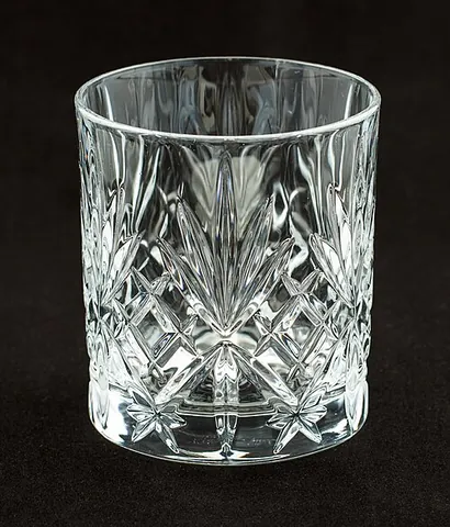 rocks glass: a short glass tumbler used for serving liquor with ice