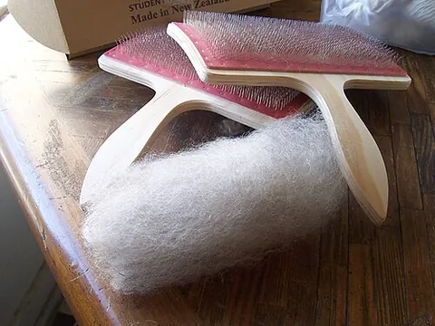 rolag: a roll of fiber, used as a precursor to yarn