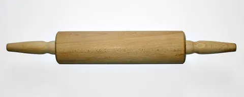 rolling pin: a food preparation utensil consisting of a cylinder with a handle at each end, used to flatten dough