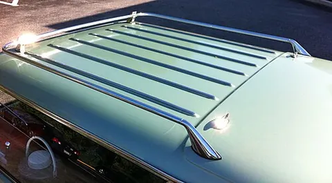 roof rack: a rack attached to the top of a car or other vehicle, used to hold luggage or similar items