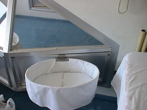 rooming-in: the practice of placing the newborn in a crib near the mother's bed, instead of in a nursery,...