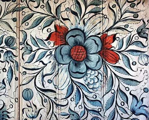 rosemaling: a Norwegian style of stylized floral decoration with scrollwork and geometric elements