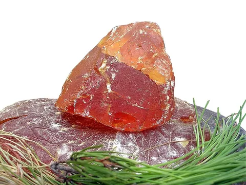 rosin: a solid form of resin, obtained from liquid resin by vaporizing its volatile components