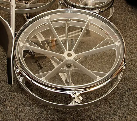 rototom: a drum that has no shell and is able to change pitch by rotating its drumhead around a threaded...