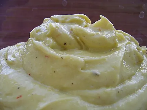 rouille: a type of sauce from Provence, France, often served with fish dishes, consisting of egg yolk and...