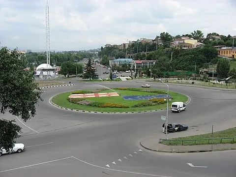 roundabout: indirect, circuitous, or circumlocutionary