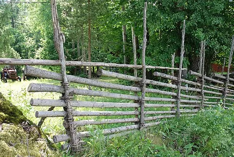 roundpole fence: a kind of wooden fence, typical of the Scandinavian countryside, usually made from unsplit young...