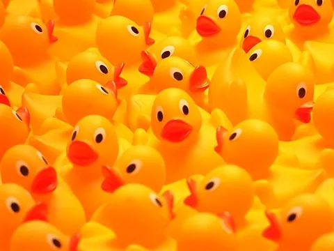 rubber duck: a toy, made from rubber or rubber-like plastic, shaped like a duck; usually a floating bathtub toy
