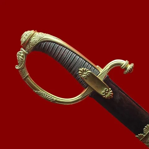 sabre: a light sword with a curved blade, sharp along the front edge, part of the back edge, and at the...