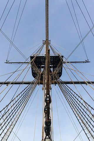 sailyard: a yard (spar or shaft) to which the sails of a ship are bent (tied or fastened to)
