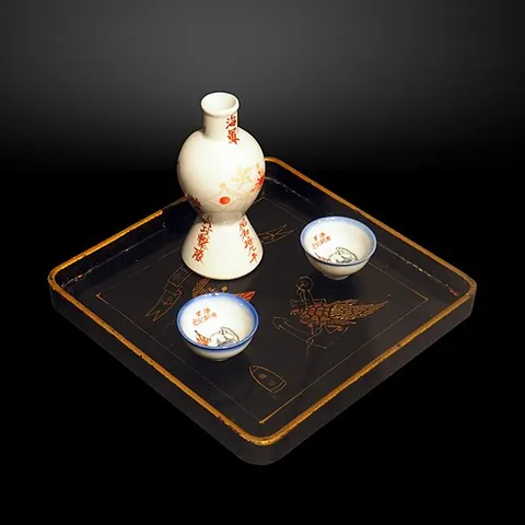 sake set: the flask and cups used to serve sake